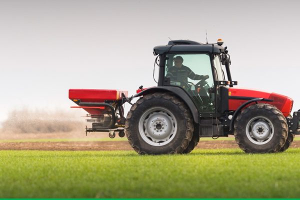Tractor spreading fertiliser - Nitrofert