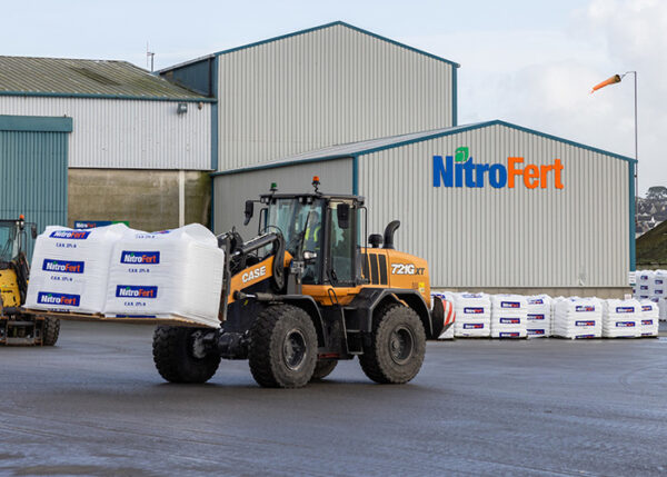 NitroFert worker moving bags of fertiliser